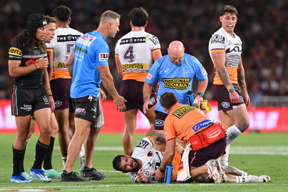 Adam Reynolds hits the deck after doing the splits in an awkward tackle.