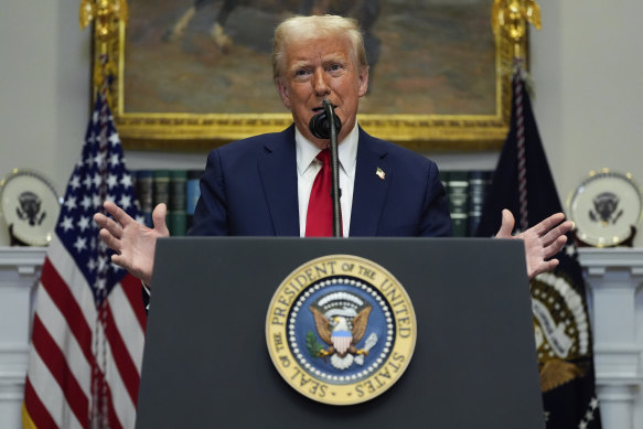 President Donald Trump speaks in the Roosevelt Room of the White House on his second day in the job.