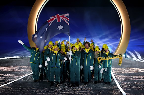 The Australian contingent in Livigno, led by flag-bearers Jakara Anthony and Matt Graham.