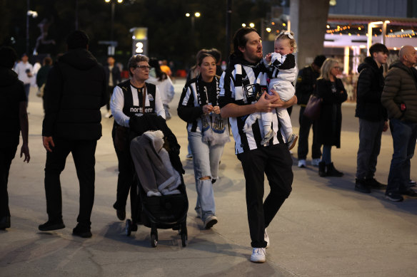 A family of Newcastle United fans head into the MCG.
