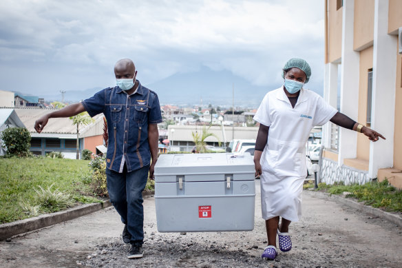 A shipment of COVAX AstraZeneca arrives in the Democratic Republic of Congo. Many poorer nations struggle to store and ship the doses they receive. 