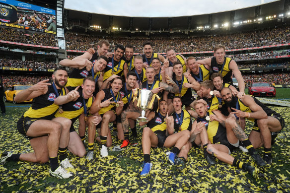 Premiers: The Tigers celebrate their big win.