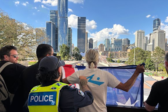 The 52-year-old man at the Brisbane rally was detained but not arrested, allegedly for breaching the peace.