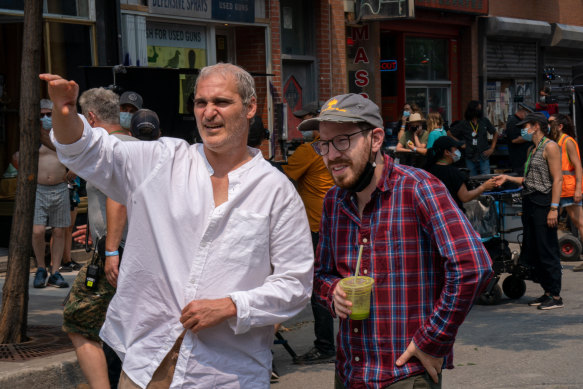 Collaborators: Star Joaquin Phoenix and writer-director Ari Aster on the set of Beau Is Afraid.