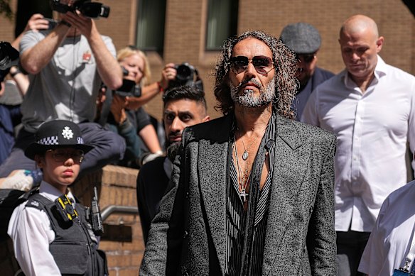 English comedian and actor Russell Brand leaves Southwark Crown Court.