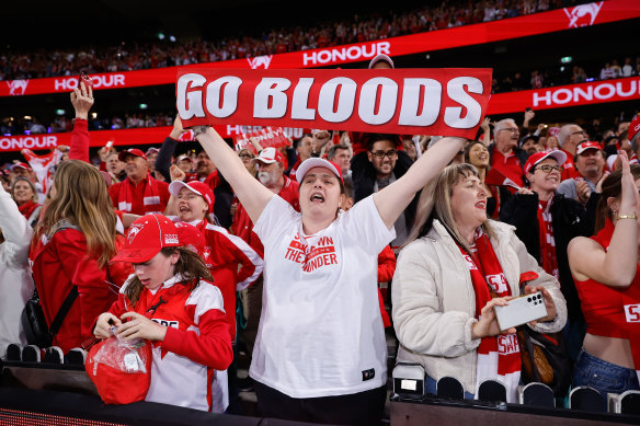 Sydney Swans fans celebrate after the siren against Port Adelaide.