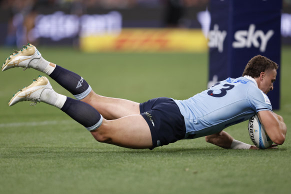 Harry Wilson scores a try earlier in the game