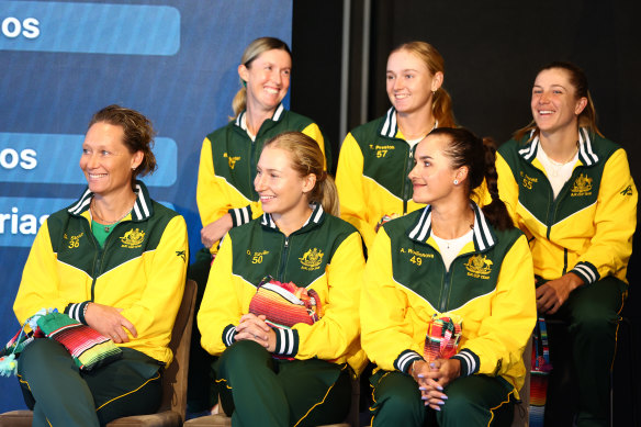 Taylah Preston (middle, second row) with Billie Jean King Cup Australian captain Sam Stosur (bottom left) and her teammates in Brisbane.