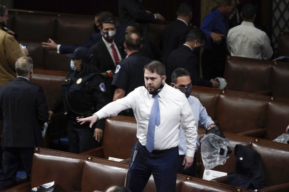 Democrat Ruben Gallego jumped on a chair to coordinate the evacuation from the House Chamber.