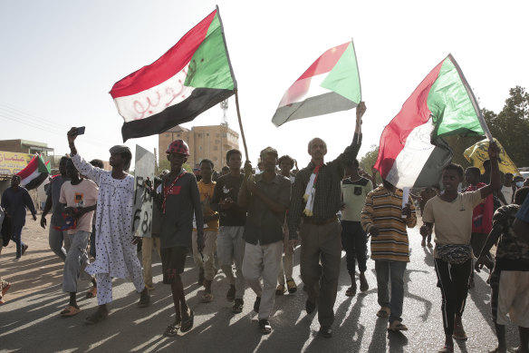 Sudanese protesters take part in a rally against military rule in Khartoum, Sudan.