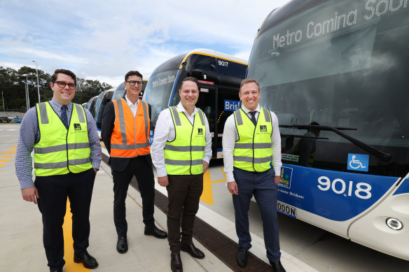 Queensland Premier Steven Miles, Brisbane Lord Mayor Adrian Schrinner, Transport Minister Bart Mellish and Council’s Transport Chair Ryan Murphy at the Rochedale Metro depot.