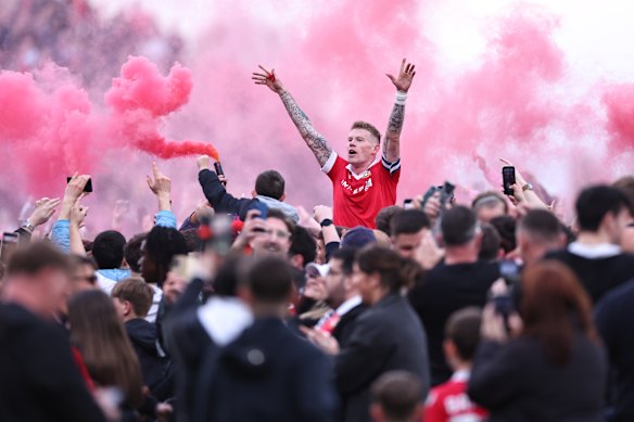 Wrexham’s James McClean celebrates after their promotion to the Championship was secured.