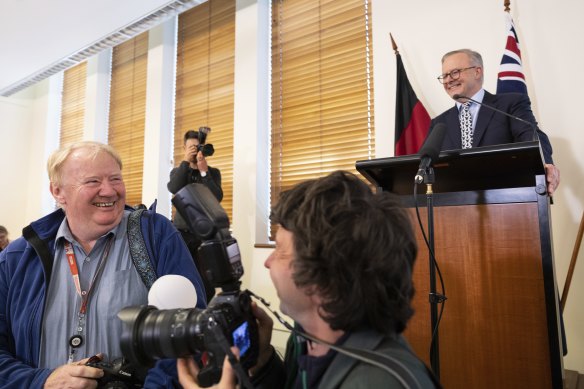 Prime Minister Anthony Albanese reacts as Guardian Australia photographer Mike Bowers’ phone rings during a Labor party caucus meeting.