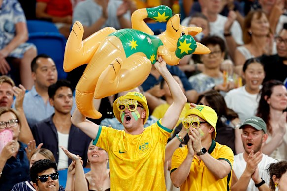 Australian fans cheer at Ken Rosewall Arena.