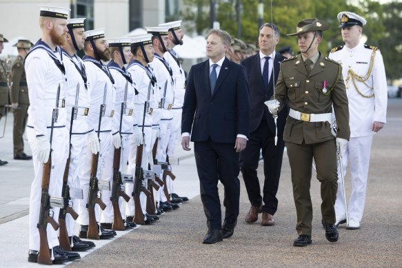 Grant Shapps, Secretary of State for Defence of the United Kingdom, and Deputy Prime Minister and Minister for Defence Richard Marles inspect Federation Guard at Blamey Square in Canberra.