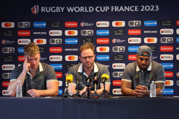 Wallabies Matt Philip and Samu Kerevi address the media in France with assistant coach Dan Palmer. 