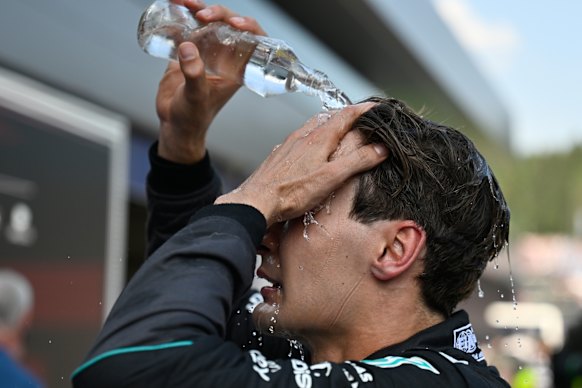 Drivers try to cool down after the race. 