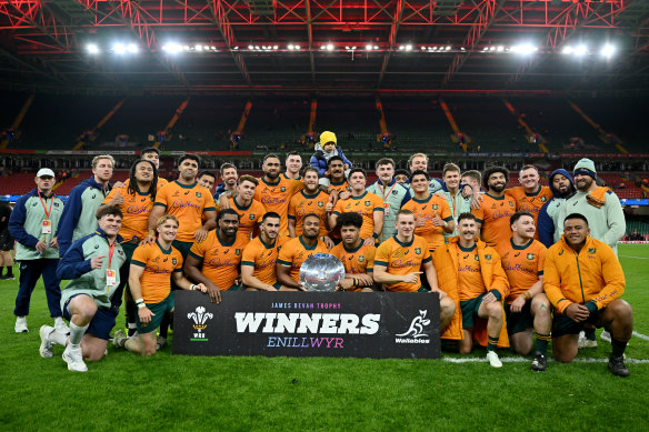 The Wallabies celebrate victory in Cardiff