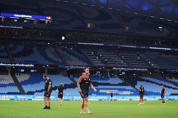 Chiefs players inspect the pitch at Allianz Stadium.