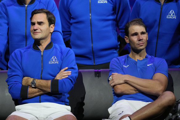 An emotional Roger Federer, left, of Team Europe sits alongside his playing partner Rafael Nadal after their Laver Cup doubles match against Team World’s Jack Sock and Frances Tiafoe at the O2 arena in 2022. 