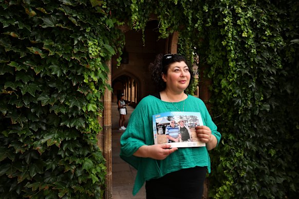Sabina with a photo of her parents Alex and Larisa Kleytman, which was taken at the Bondi Hannukah festival.  