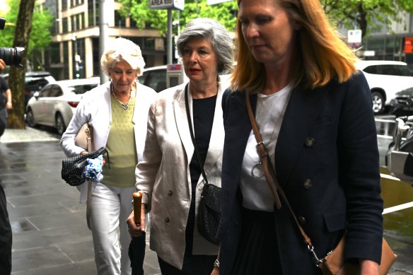 Friends and family of Carol Clay outside court.