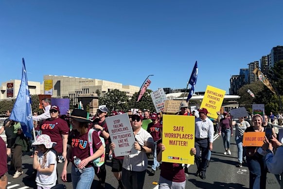 Teachers march over the Victoria Bridge on Wednesday.