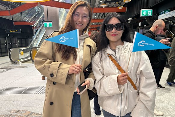 Passengers Karen Tsui and Hannah Li at Parkville station.