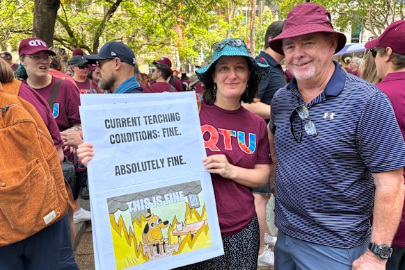 Primary school teacher Jen McMahon and semi-retired teacher Rod Heggie strike in Brisbane.