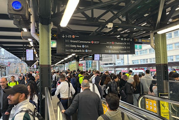 Commuters crowd on to platforms at Central Station on Wednesday afternoon. 