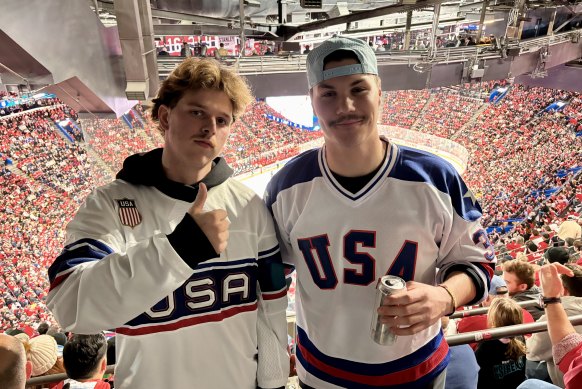 Jason Greenleaf (right) and Archibald Erickson, from Maine, at the USA-Canada ice hockey match in Montreal.