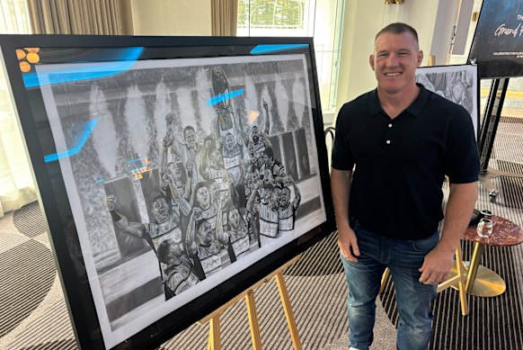 Paul Gallen with the artwork celebrating the 2016 premiership-winning Sharks side.