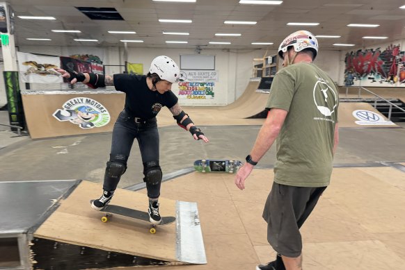 Anneliese Mason and coach Al at Al’s Skate Co in Wodonga.