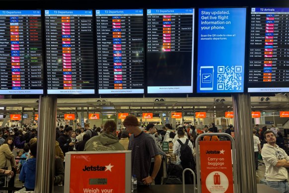 Sydney domestic airport was thrown into chaos after a global IT crash. 