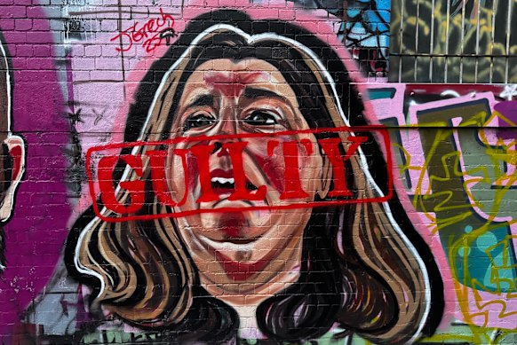 A graffiti mural Erin Patterson has been altered to add the word ‘guilty’ in a laneway near the Queen Victoria Market.
