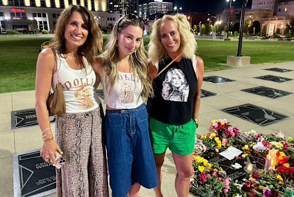 Heidi Ludwig (right) with her friends Lauren and Kimberly Hartog at Dolly Parton’s star on the Music City Walk of Fame.