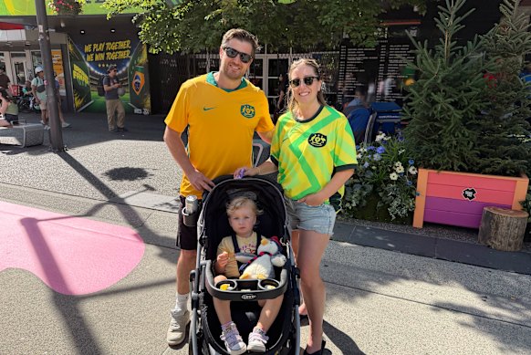 Steve Tomamichel, who moved to Canada from Australia eight years ago and will be at Sunday’s game, and Courtney Amlinger on Granville Street.