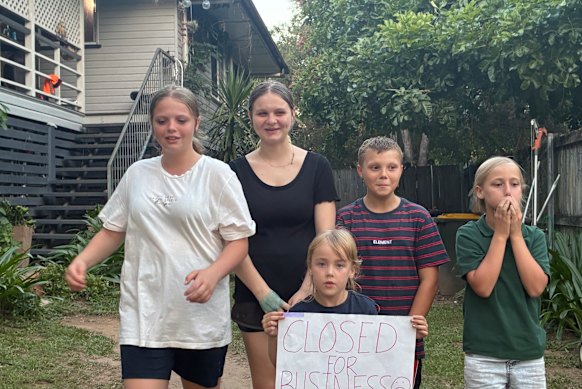 Kelly Stothard’s three children and their neighbours who ran the weekend bake sale.