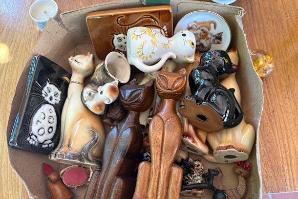 I found a box filled with statues of cats in my attic. No one knows how they got there but I’ve managed to find them a new home.