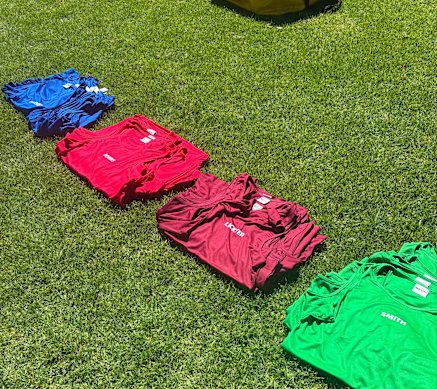 Kangaroos training bibs with the names of former Australian greats Andrew Johns, Darren Lockyer and Cameron Smith.