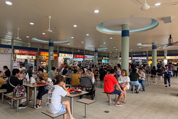 Sharing a plate of tasty, cheap fare alongside locals.