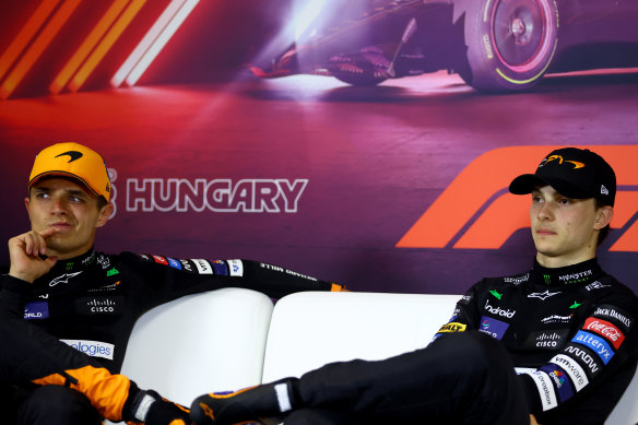 Oscar Piastri (right) scored his first F1 win after teammate Lando Norris was ordered to let him through.