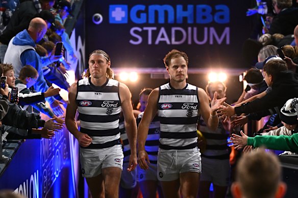 Mark Blicavs and Jake Kolodjashnij leading the Cats out in Geelong in round six against the Bulldogs.