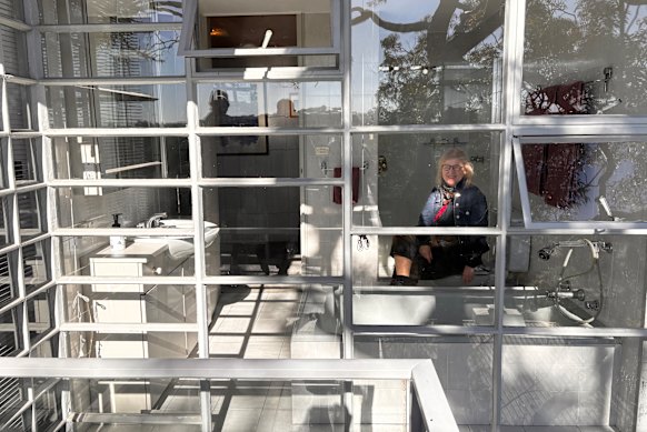 The view from the toilet and bath is spectacular, said Julie Power, pictured, but the view of the bathroom from the deck outside is probably less attractive.