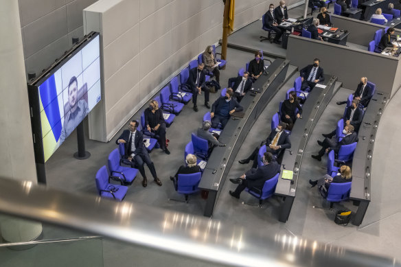 Ukrainian President Volodymyr Zelensky addresses the German Bundestag via live video from the embattled city of Kyiv on Thursday.