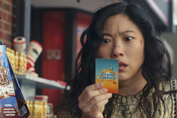 Katie Kim (Awkwafina) discovers she has won the lottery in Jackpot!