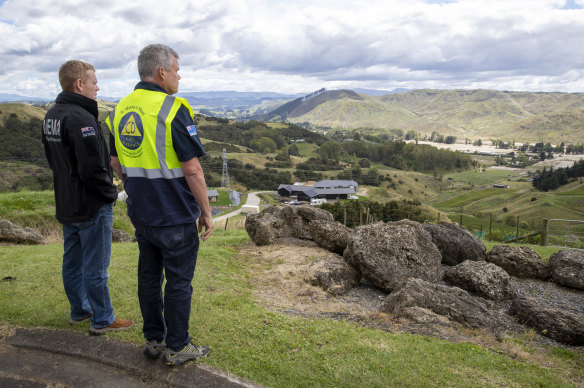 New Zealand Prime Minister Chris Hipkins, left, and Hawke’s Bay Civil Defence and Emergency Management Group Controller Ian McDonald survey cyclone Gabrielle damage to the Esk Valley, north of Napier.