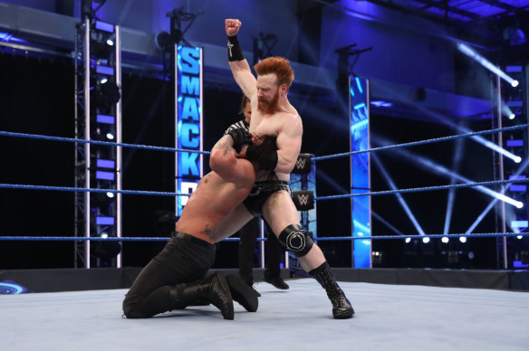 Former NRL player Daniel Vidot wrestles Sheamus on WWE Smackdown. 