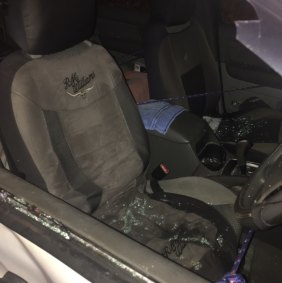 Police smashed through the vehicle's window to pull the driver out.
