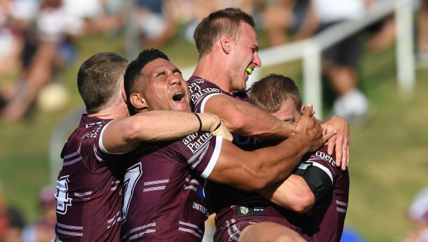Eagles rock: Manly celebrate Lachlan Croker's try.